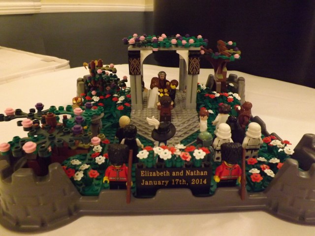 A garden wedding scene with some of their favorite fictional characters. It actually made Nathan take his eyes off his bride for a whole second and a half!