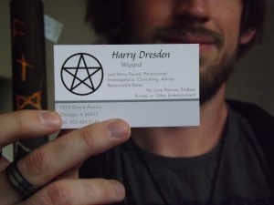 A cosplayer at AwesomeCon, with Harry Dresden's actual business card as described in the books. 